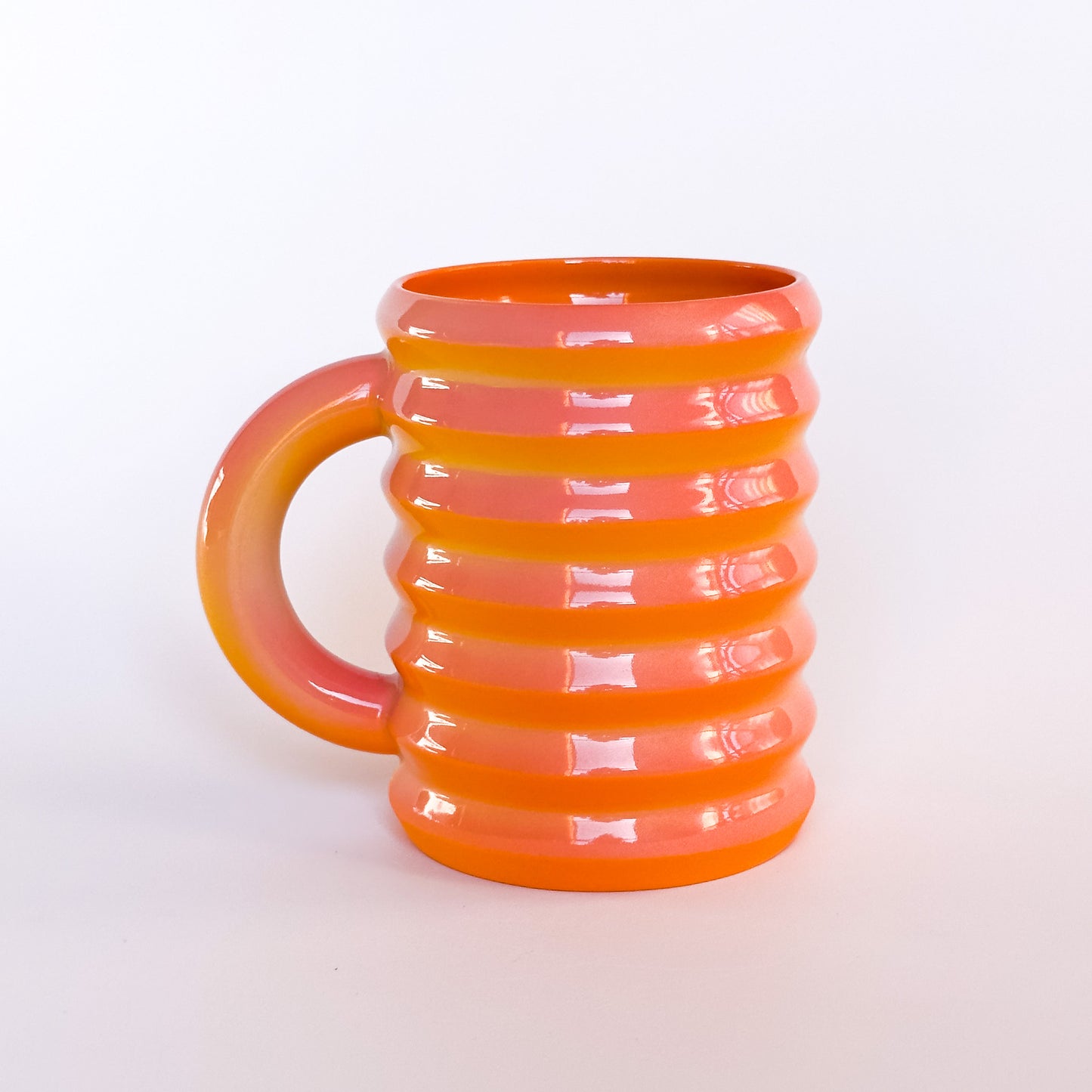 Wiggle Mug in pink/orange/yellow