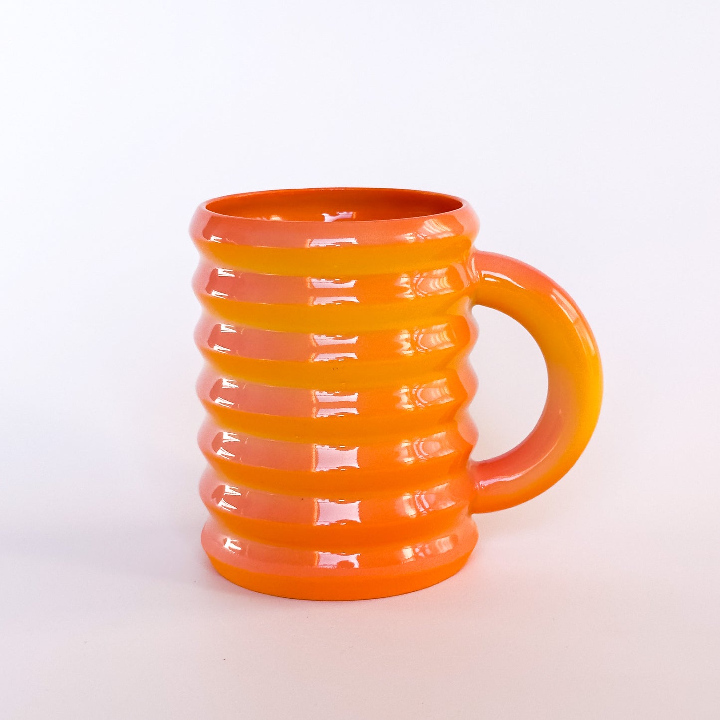 Wiggle Mug in pink/orange/yellow