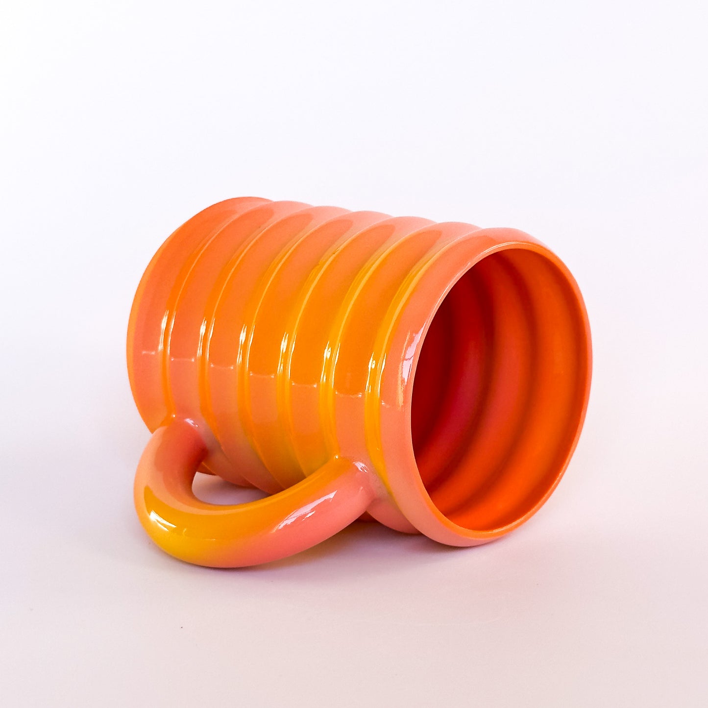 Wiggle Mug in pink/orange/yellow